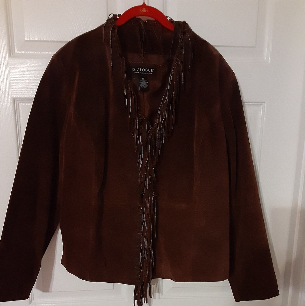 Leather jacket, never worn. A little retro, definitely bohemian.